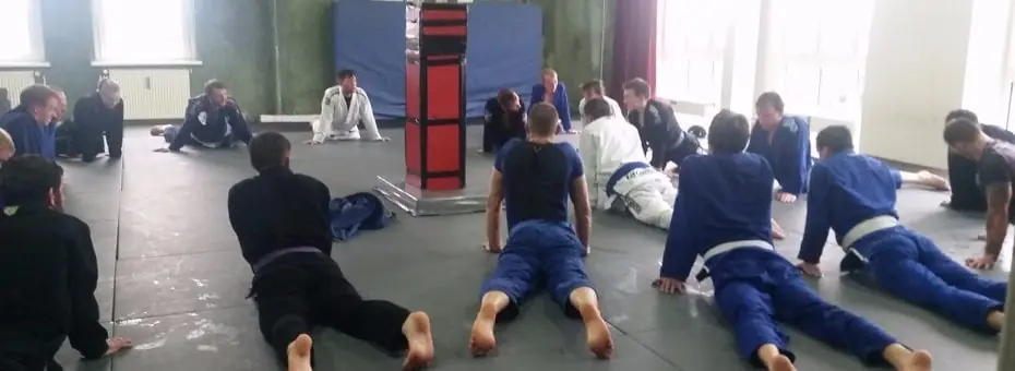 The class doing their cool down stretches.