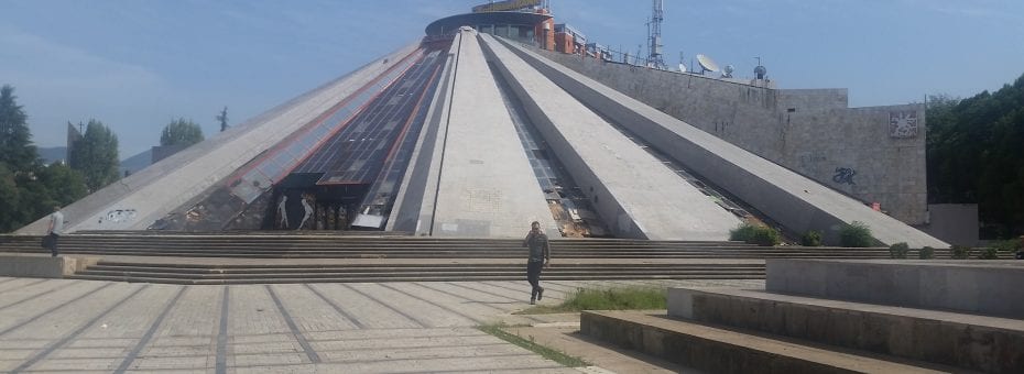 The Pyramid of Tirana, once a museum to Enver Hoxha now graffiti covered landmark people love climbing to the top of to take pictures.