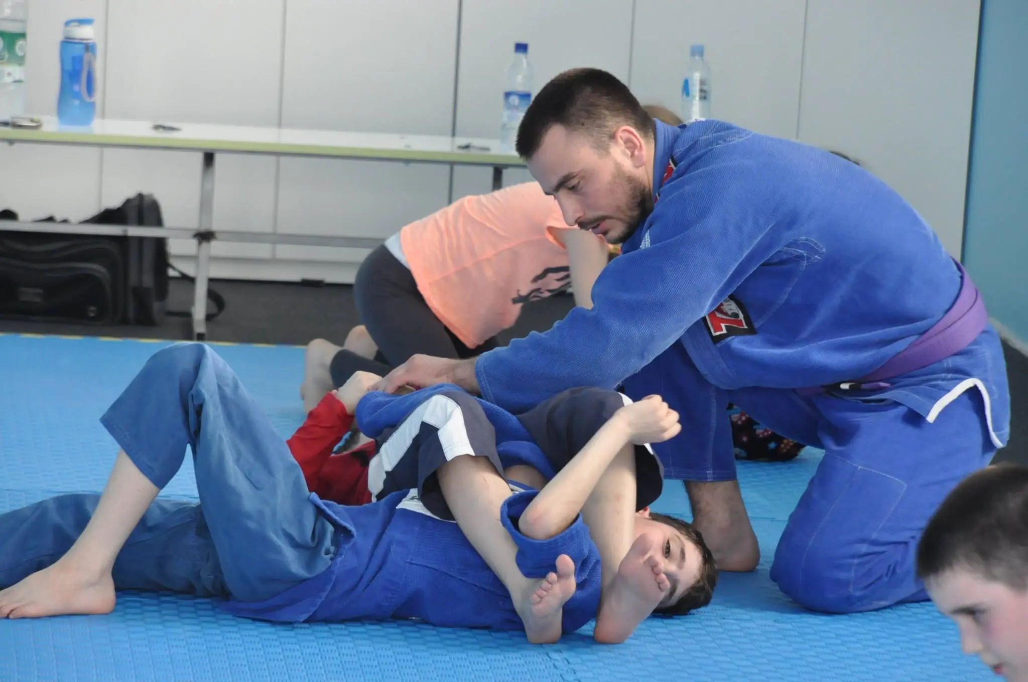 Sandu teaching a kids class in Moldova