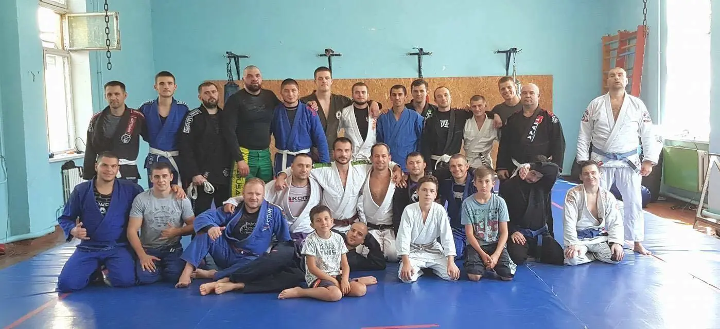 A current picture of Sandu's Brazilian Jiu-Jitsu team in Moldova. Sandu is seated in the middle, 5th from the left.