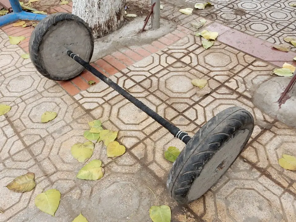 Hanoi, Vietnam: DIY workout equipment near my home, cleverly made of scooter tires filled with cement!