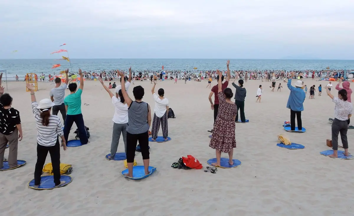 DaNang, Vietnam: People practicing Falun Gong at the beach