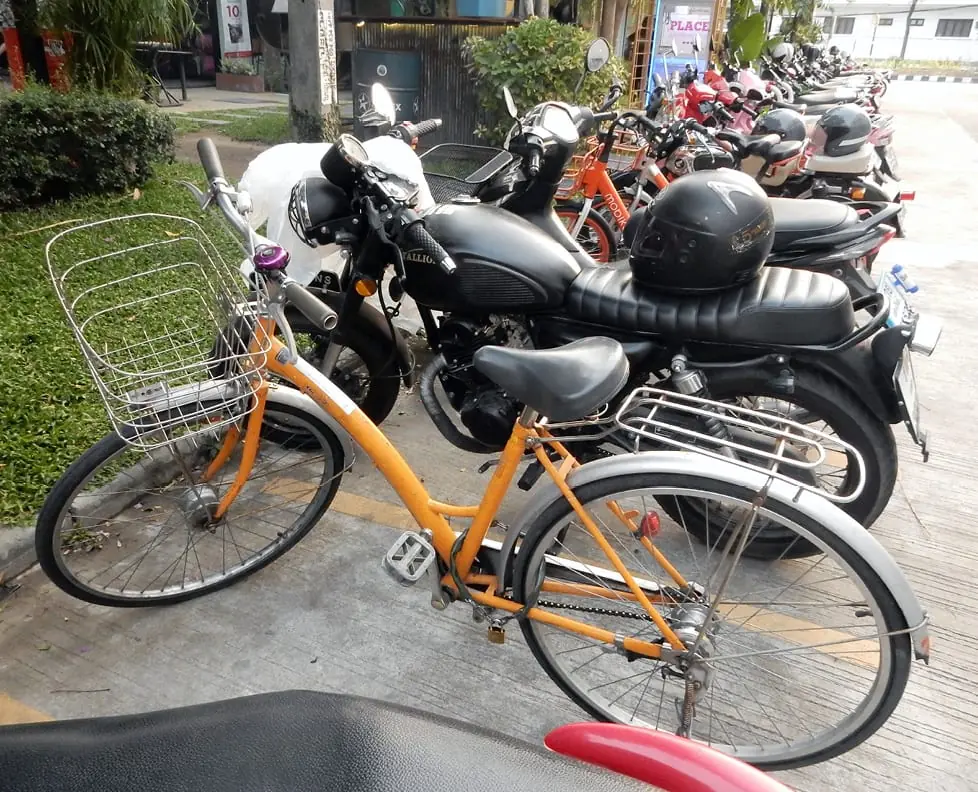 Chiang Mai, Thailand: My bike hanging out in the scooter parking lot